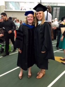 two women in regalia