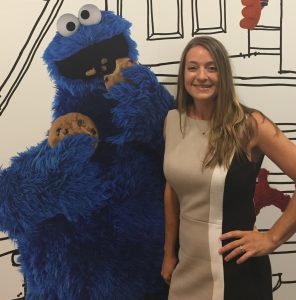 woman posing with cookie monster