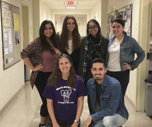 group posing in hallway